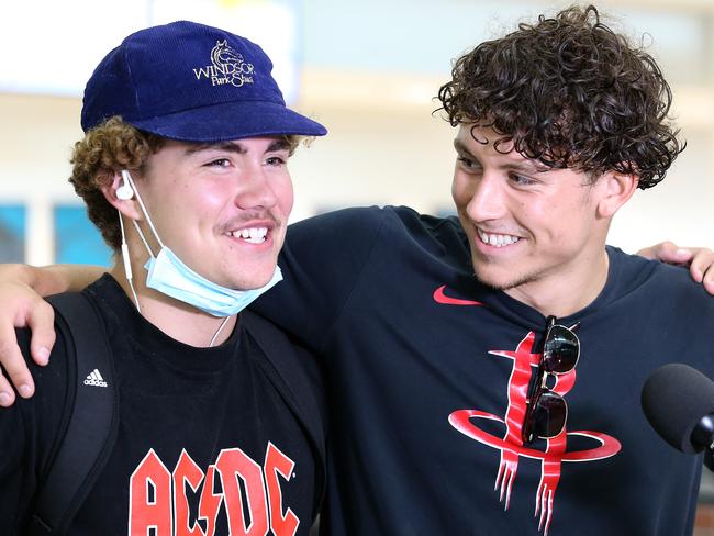 Tarquin Magner (left) is greeted by good friend Michael Pickett Brisbane. Picture: Jono Searle/Getty Images