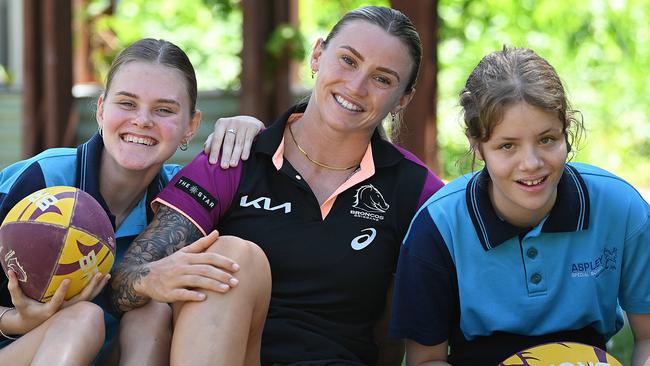 Broncos inaugural NRLW player Julia Robinson, who has re-signed to become a club member for life, with fans Sophie Hendy, 17, and Caitlin Peall, 15, at Aspley Special School, in Aspley, Brisbane. Picture: Lyndon Mechielsen/Courier Mail