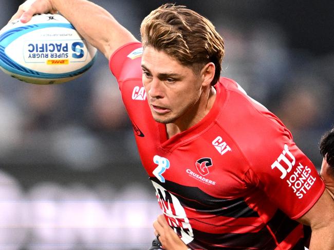 CHRISTCHURCH, NEW ZEALAND - FEBRUARY 14: James O'Connor of the Crusaders charges forward during the round one Super Rugby Pacific match between Crusaders and Hurricanes at Apollo Projects Stadium, on February 14, 2025, in Christchurch, New Zealand. (Photo by Joe Allison/Getty Images)