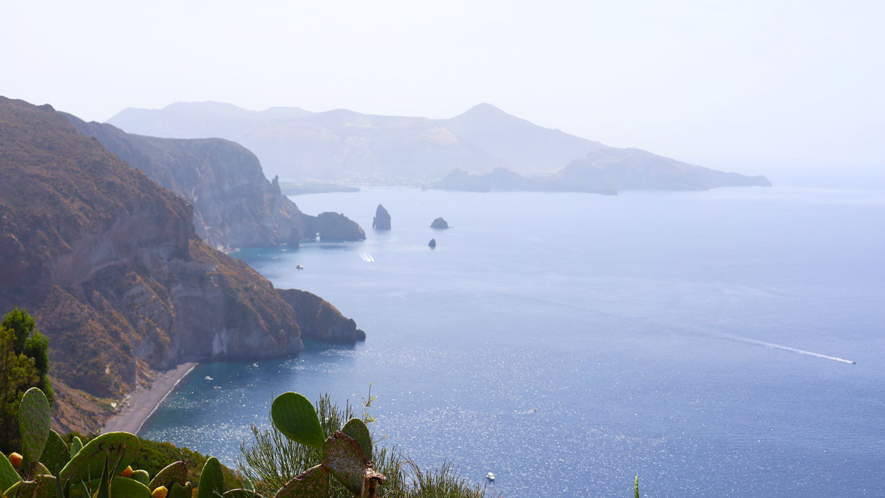 <p><span>Imagine a high-speed boat whisking you away to an island where cobblestone alleyway labyrinths, ancient ruins, cascading bougainvillea, and mouthwatering regional treats await. It&rsquo;s a perfect day trip that feels like stepping into another world.</span></p><p><span>Lipari is a captivating gem nestled in the heart of the UNESCO-listed Aeolian Islands, that too often slips under travellers' radar. Leaving the Sicilian mainland in my wake, I headed off with Bunnik Tours and a local guide to explore the island.&nbsp;</span></p><p><strong>See also:</strong> <a href="https://www.escape.com.au/destinations/europe/italy/popular-italian-cities-you-shouldnt-visit-during-summer-and-where-to-go-instead/image-gallery/a5c28eadd30a3a346b5457277816a17e" target="_blank" rel="noopener">Popular Italian cities you shouldn&rsquo;t visit during summer and where to go instead</a></p><p><span>The largest of the Aeolian Islands, Lipari blends history and beauty. Expect elegant townhouses next door to simple stone dwellings against a backdrop of an ancient citadel and sweeping coastline views surrounded by a turquoise sea.</span></p><p><span>The one-hour hydrofoil ferry ride leaves from Milazzo on Sicily&rsquo;s northern coast to Lipari, but you can also travel from Palermo and Calabria. Step off onto the jetty and walk down the Corso Vittorio Emanuele to find the island's vibrant local culture without the mainland&rsquo;s crowds.</span></p><p><span>Here&rsquo;s why Lipari should be on your must-visit list.</span></p><p><em>Picture: Kerry Heaney</em></p>