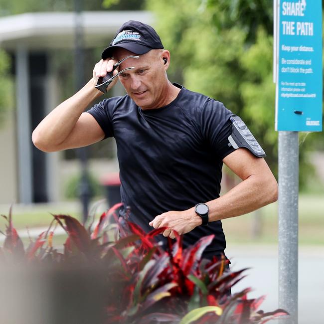 Stood-down cop Senior Sergeant Arron Ottaway out jogging on the Gold Coast after facing disciplinary action over a police pursuit. Picture: Nigel Hallett