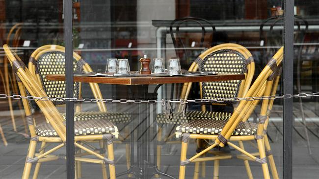 A restaurant is chained off after eateries were forced to shut. Picture: Quinn Rooney/Getty Images