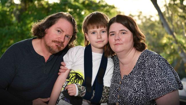 Oscar Girdler, 7, with his parents Nathan and Jessica Girdler. Photo: Patrick Woods.