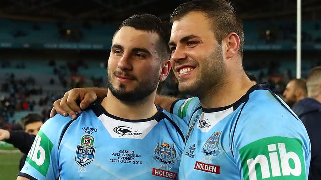 SYDNEY, AUSTRALIA - JULY 13: Jack Bird of the Blues and Wade Graham of the Blues celebrate winning game three of the State Of Origin series between the New South Wales Blues and the Queensland Maroons at ANZ Stadium on July 13, 2016 in Sydney, Australia. (Photo by Cameron Spencer/Getty Images)