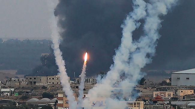 Palestinian militants fire rockets towards Israel from Rafah, southern Gaza Strip. Photo by SAID KHATIB / AFP