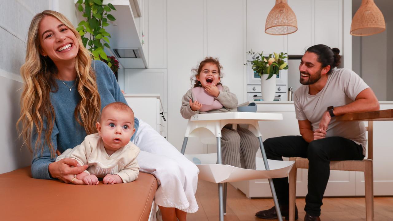 Dr Rachel Cohen with her husband Brad and their children Tal, 4 months, and Maya, 3, at home, in North Bondi. Picture: Justin Lloyd.