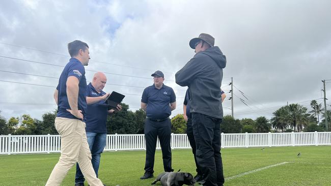 Canterbury Bulldogs CEO, Aaron Warburton, Team Manager Stephen Litvensky, Suncorp Stadium Curator Mal Caddies and the groundsman for Bundaberg's Salter Oval inspect the playing ground before the Bulldogs and Cowboys match on August 7.