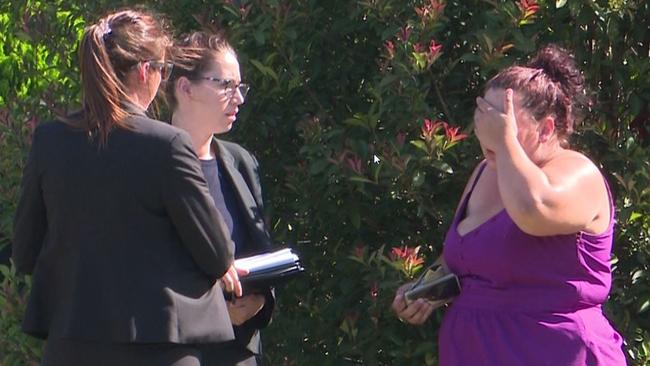 A distraught woman talks to police. Picture: TNV