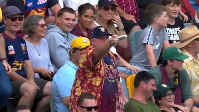 Lions fan offers up some tissues. Credit: Fox Footy