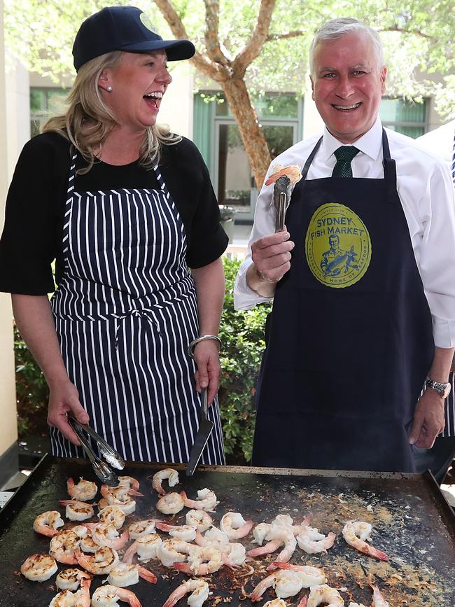 Senator Bridget McKenzie and Deputy PM Michael McCormack cooking at the Nationals’ annual Seafood BBQ at Parliament House. Picture: Kym Smith