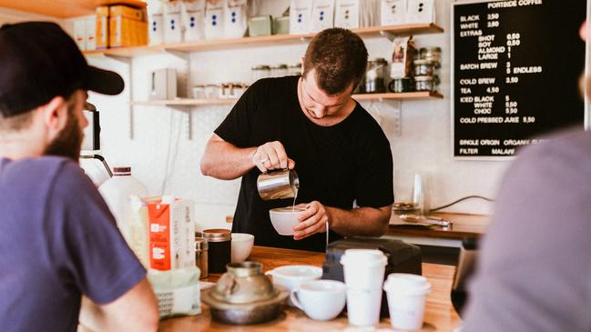 The morning ritual at Portside Coffee, Currumbin Waters.