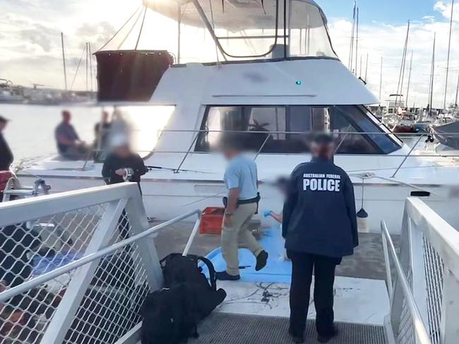 Federal police officers with the vessel