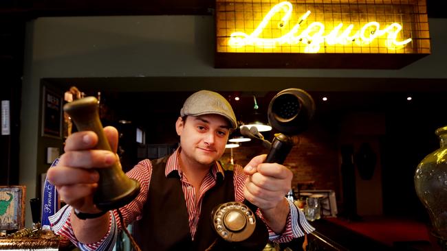 Copperhead Road is a rooftop 20s style speak-easy with period costume bar staff. Jay Brown makes a lot of smoking cocktails. Picture: Nicole Cleary