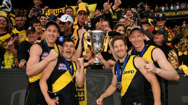 Tom Lynch, Jayden Short, Kane Lambert and Dylan Grimes celebrate the Grand Final win at the MCG last year. We won’t see these scenes at the MCG in 2020. Picture: Mark Stewart