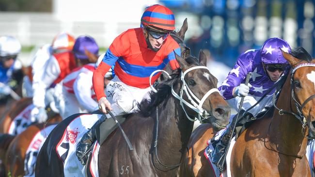 Mark Zahra won the Caulfield Cup aboard Verry Elleegant. Picture: Racing Photos