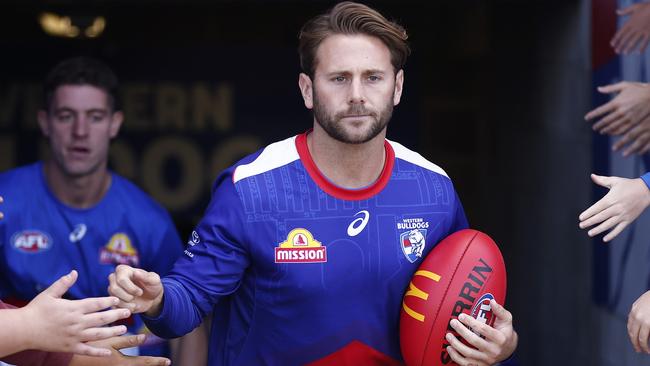 BALLARAT, AUSTRALIA - MARCH 24: Caleb Daniel of the Bulldogs runs out for warm up before the round two AFL match between Western Bulldogs and Gold Coast Suns at Mars Stadium, on March 24, 2024, in Ballarat, Australia. (Photo by Daniel Pockett/Getty Images)