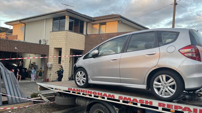 The car being towed from the scene.