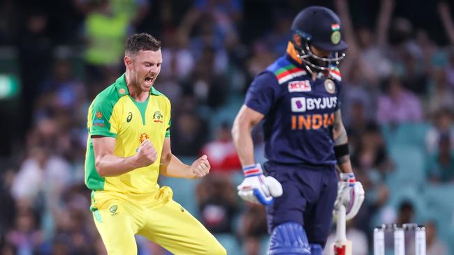 Josh Hazlewood celebrates taking the wicket of Virat Kohli. Picture: DAVID GRAY /AFP