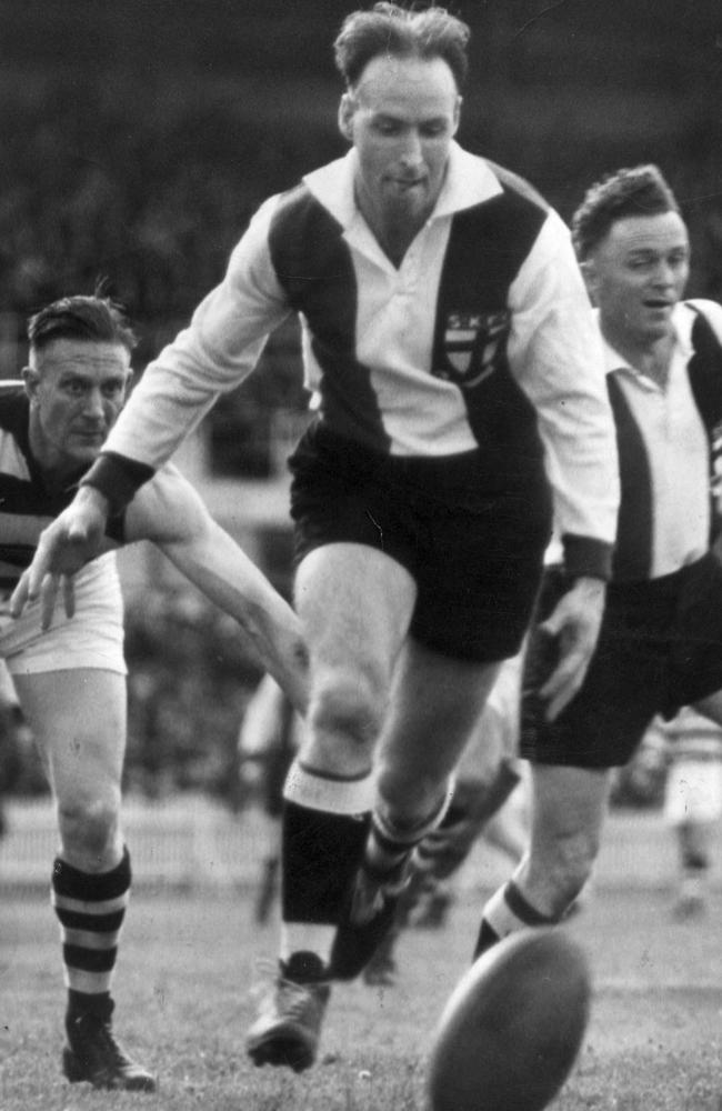 By the 1930s, St Kilda’s stars wore a jumper much more familiar to today’s fans. Saints forward Bill Mohr chases the ball in a match against Geelong in May 1938. Picture: News Corp Australia