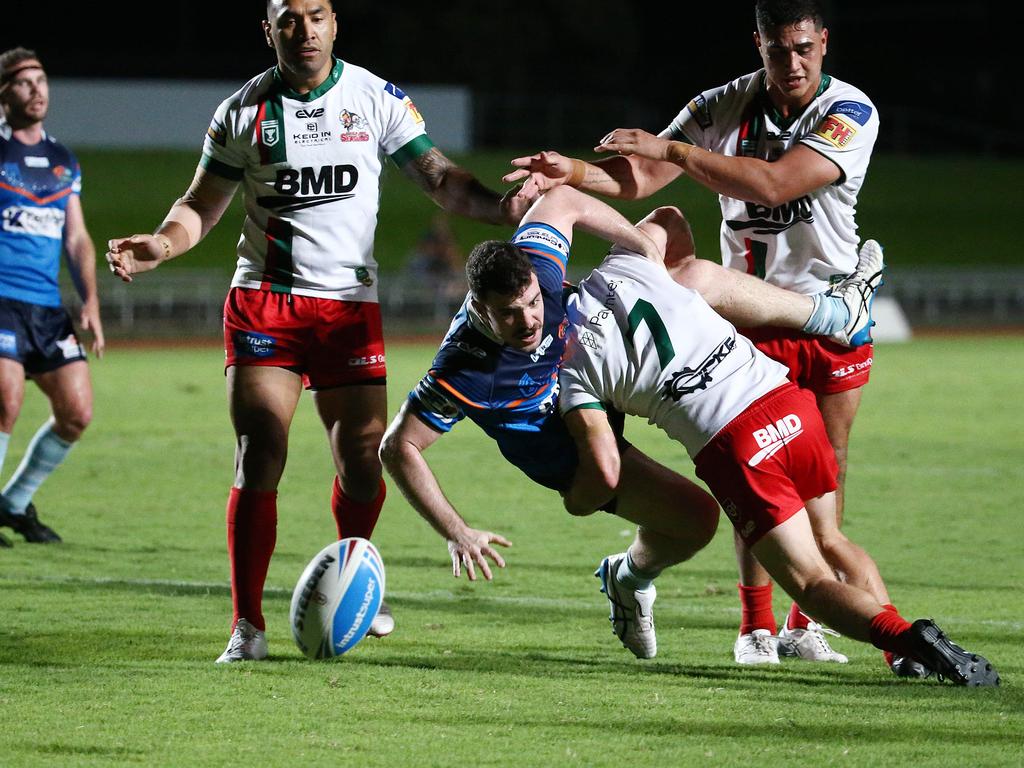 Pride's Ewan Moore loses the ball in a tackle in the QRL ISC rugby league match between the Northern Pride and the Wynnum Manly Seagulls, held at Barlow Park. Picture: Brendan Radke