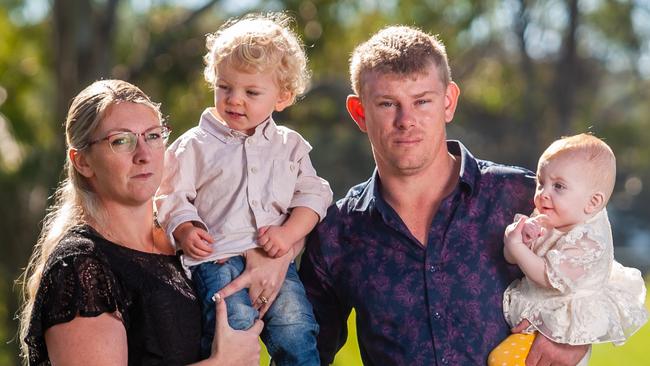 Mel Martin and Dylan Wadley with Ace, 18 months, and Hope, six months. The couple lost two children in an accident at Wyaralong Dam. Picture: David Martinelli