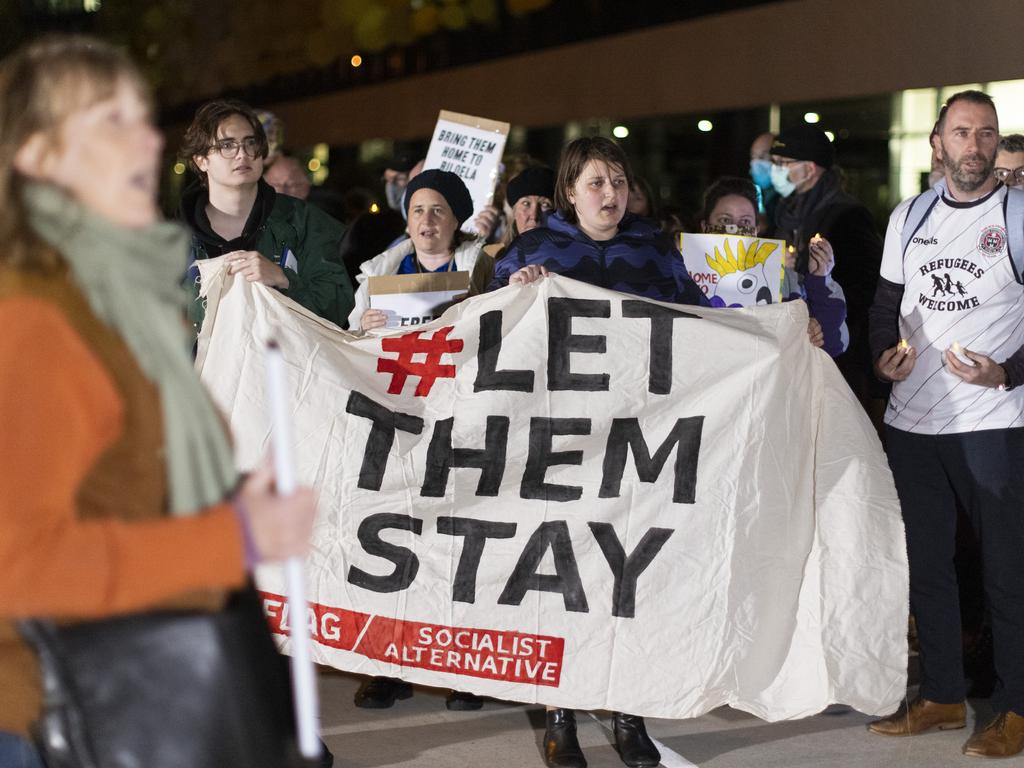 Members of the public hold a vigil outside the Perth Children's Hospital where Tharnicaa, 3, is receiving medical care. The family has been detained on Christmas Island since 2019. Picture: Getty Images