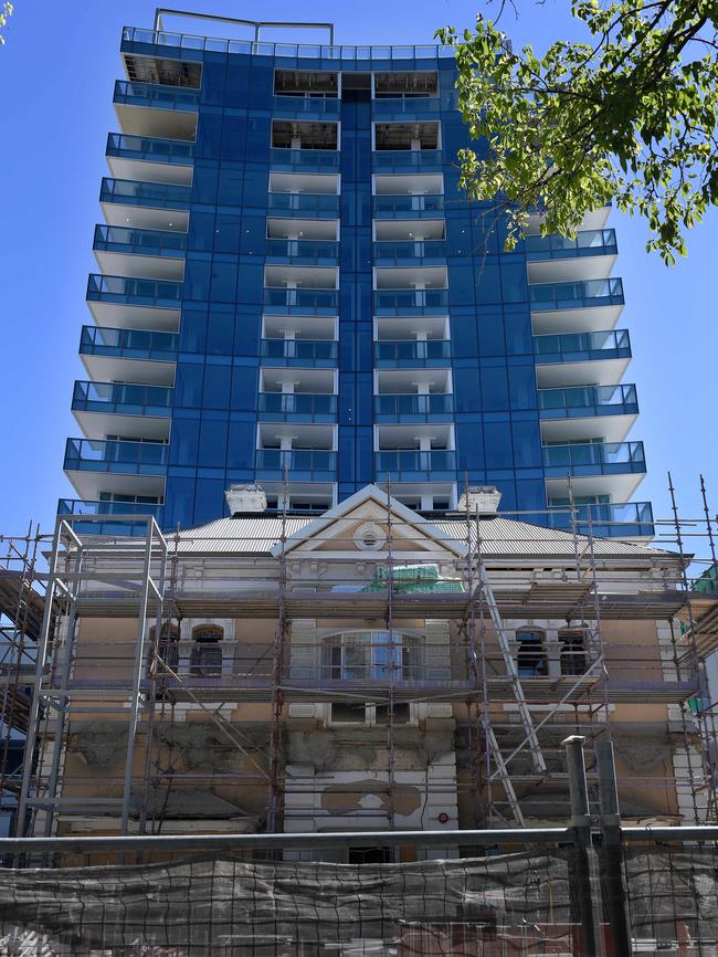 Davaar House, pictured in front of the August Towers in March, is on the market for $2 million. Picture: Naomi Jellicoe.