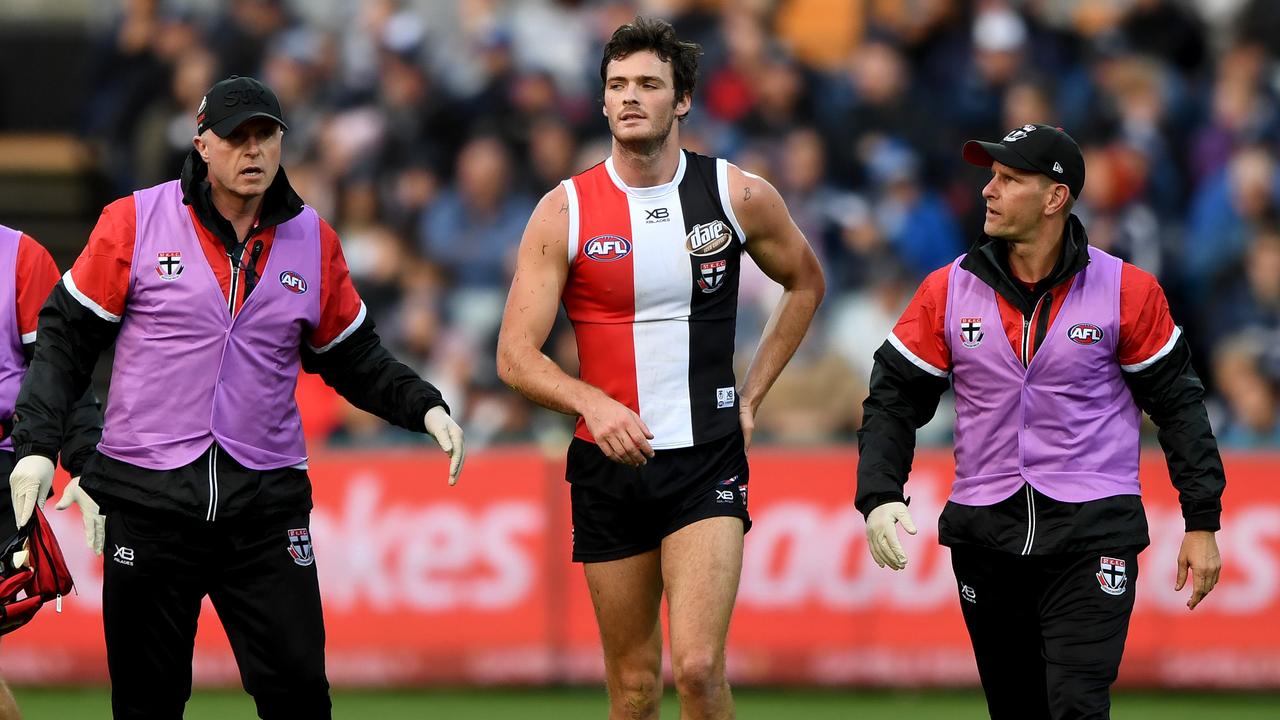 Dylan Roberton is taken from the field after collapsing.