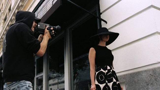 Heath Ledger shooting and directing Grace Woodroofe in a video for Quicksand. Picture: Supplied.