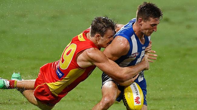 Nick Holman flies for a tackle on Shaun Atley. Picture: Getty Images