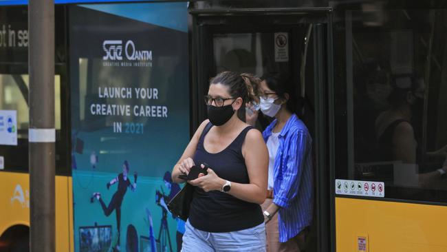 Bus passengers are being urged to wear masks after a COVID outbreak in Sydney. Picture: Mark Evans/Getty Images