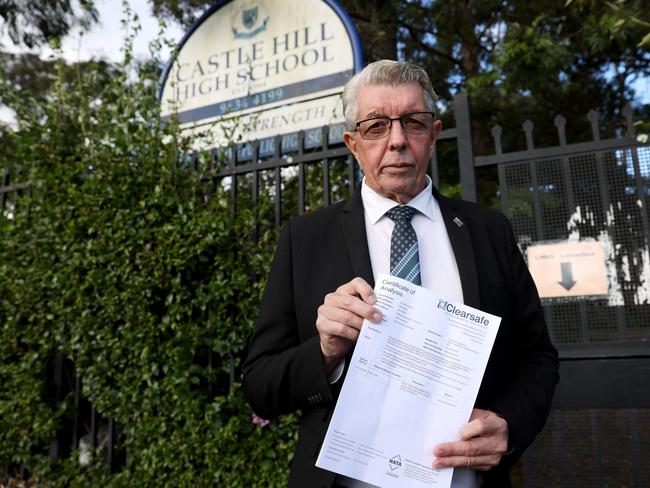 Castle Hill MP Ray Williams with the asbestos report. Picture: Damian Shaw