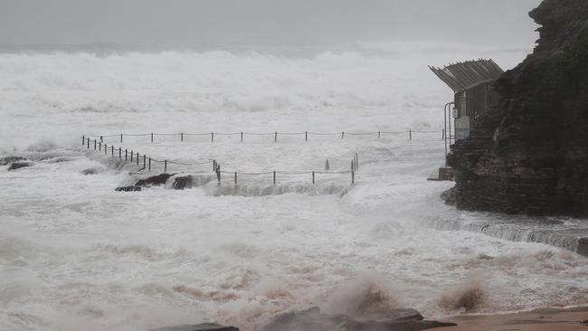 Avalon pool virtually disappeared in big seas. Picture: Martin Lange