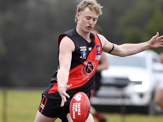 MPNFL Division One Seniors football, Round 12. Frankston Bombers vs Rosebud at Baxter Park Frankston South, Victoria, Saturday 29th June 2024. Bomber Mitchell Charles kicks one away. Picture: Andrew Batsch
