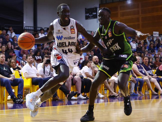 Sunday Dech drives to the basket against South East Melbourne Phoenix. Picture: Graham Denholm/Getty Images.