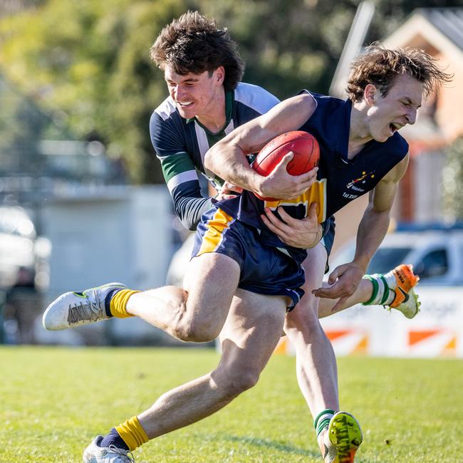 James Es playing for St Patrick’s College tackles Whitefriars opponent Byron Parton. Picture: Jake Nowakowski