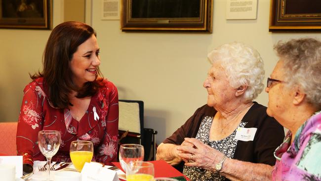 Premier Annastacia Palaszczuk speaks with Mabel Crosby, 109, at the Centenarians The 100+ Club. Picture: AAP Image/Claudia Baxter