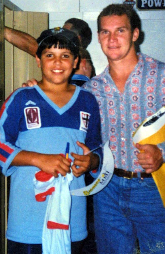 A 10-year-old Carl Webb pictured with his hero, Allan Langer. Picture: Supplied