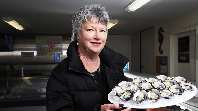 Prime Oysters manager Jane Kenane with freshly shucked pacific oysters as Vietnam, Thailand and Singapore are some of the top emerging markets for their premium seafood products. Picture: ZAK SIMMONDS