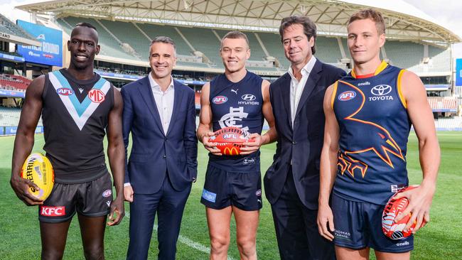 Port Adelaide’s Aliir Aliir, Premier Peter Malinauskas, Carlton captain Patrick Cripps, AFL CEO Gillon McLachlan, and Crows captain Jordan Dawson at Adelaide Oval in the lead-up to Gather Round. Picture: NCA NewsWire / Brenton Edwards