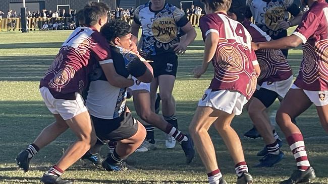 Iona prop Hopa Leota twisting over to score a try against Saints..