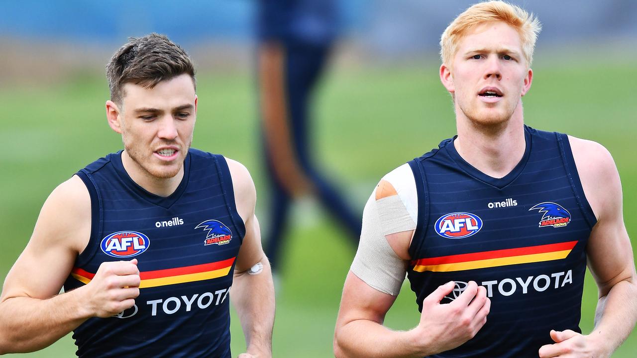 Paul Seedsman and Elliott Himmelberg during Crows training at West Lakes this morning Tuesday ,July,10,2021.Picture Mark Brake