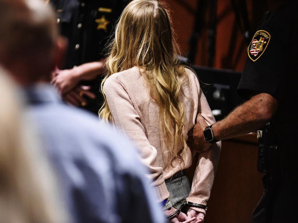 Brooke Skylar Richardson is escorted out of the courtroom in handcuffs. She will be sentenced tomorrow after being found guilty of corpse abuse. Picture: Nick Graham/The Journal-News/AP