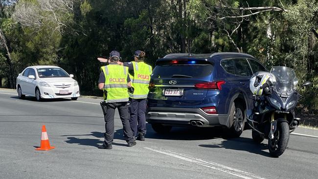 Both lanes are closed along Mackie Rd between Old Gympie Rd and Ferrier Rd. Picture: Aaron Goodwin