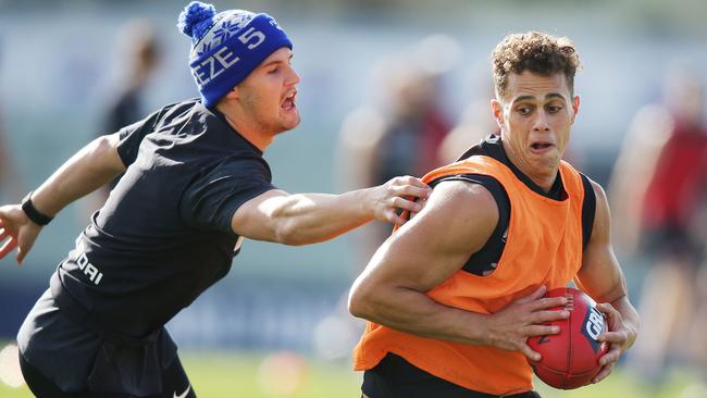 Ed Curnow kept Lachie Neale quiet after halftime. Picture: Michael Dodge/Getty Images