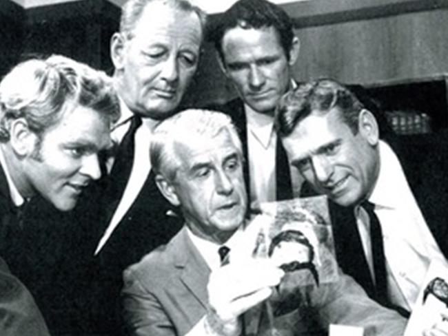 Detective Senior-Constable Reginald Henderson (centre) with the stars of TV police show Homicide. Henderson played himself in an episode in 1970.