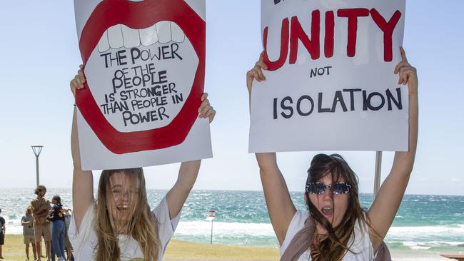 Protesters clash with police, riot squad in Byron Bay during The freedom protest on Saturday, September 18.