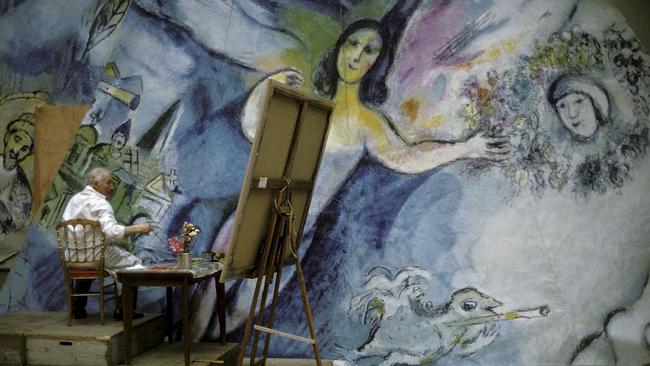 Revealed ... Marc Chagall working on his mural for the Paris Opera house. Pic: Supplied by Paris Match magazine