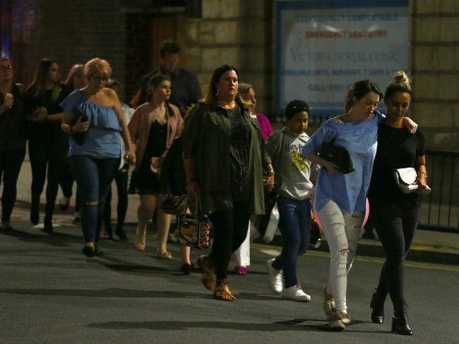 More members of the public are escorted from the Manchester Arena. Picture: Getty