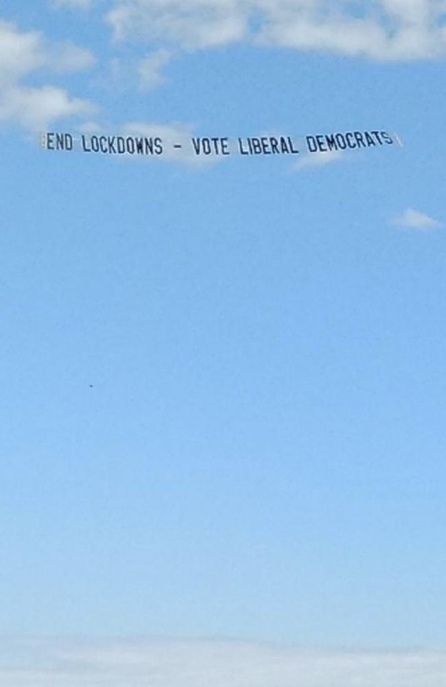 Anti-lockdown Liberal Democrats banner which was flown over the NSW border on Sunday. Picture: John Ruddick